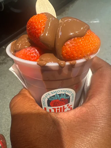 Strawberries smothered in flowing chocolate